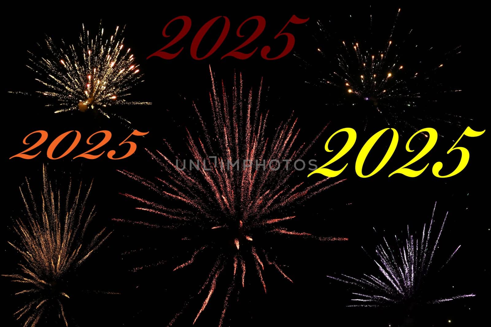 Turn of the year 2025 with various New Year's Eve rockets in the black sky