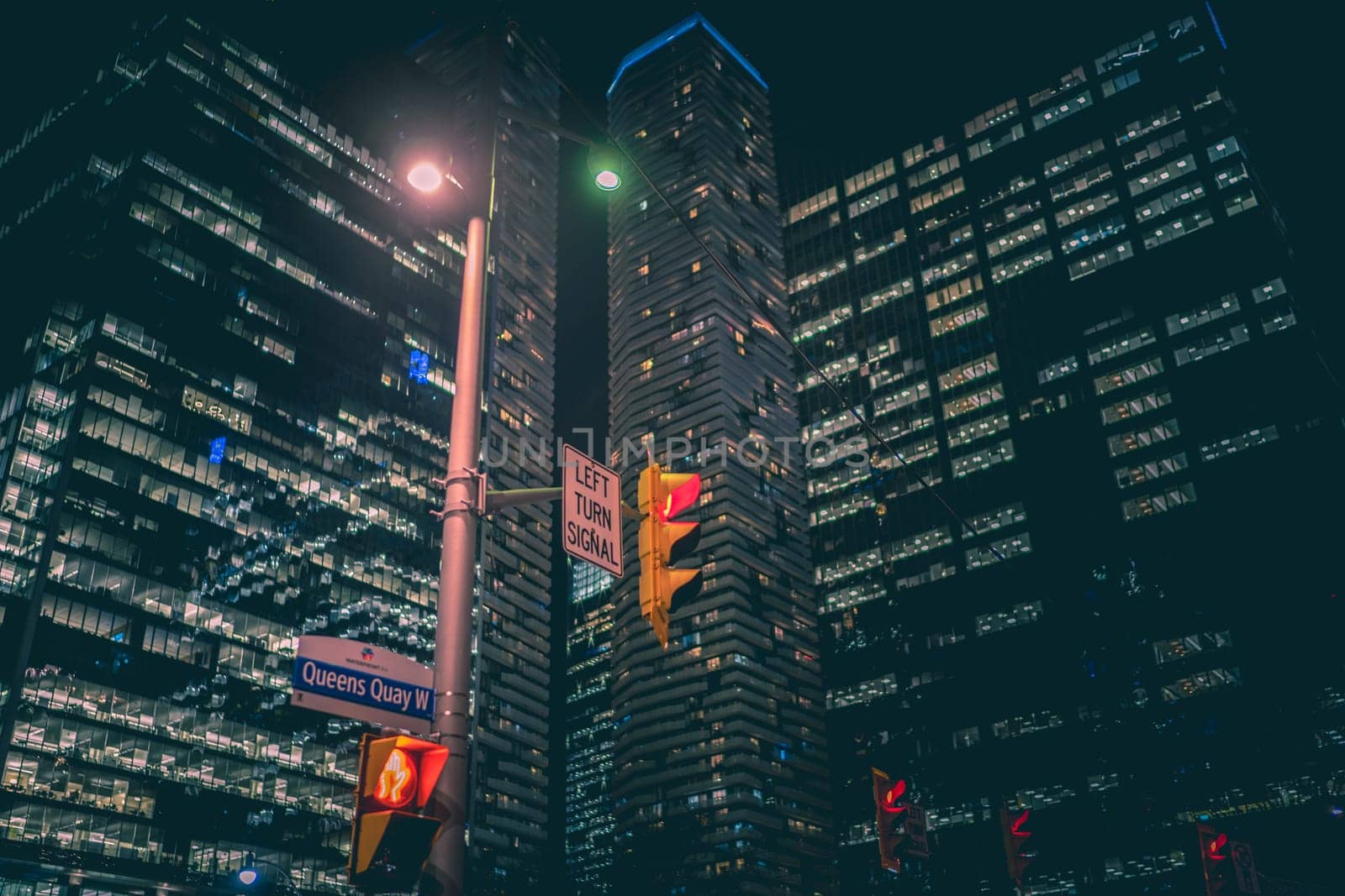Crossroads and skyscrapers at night. Shooting Location: Toronto