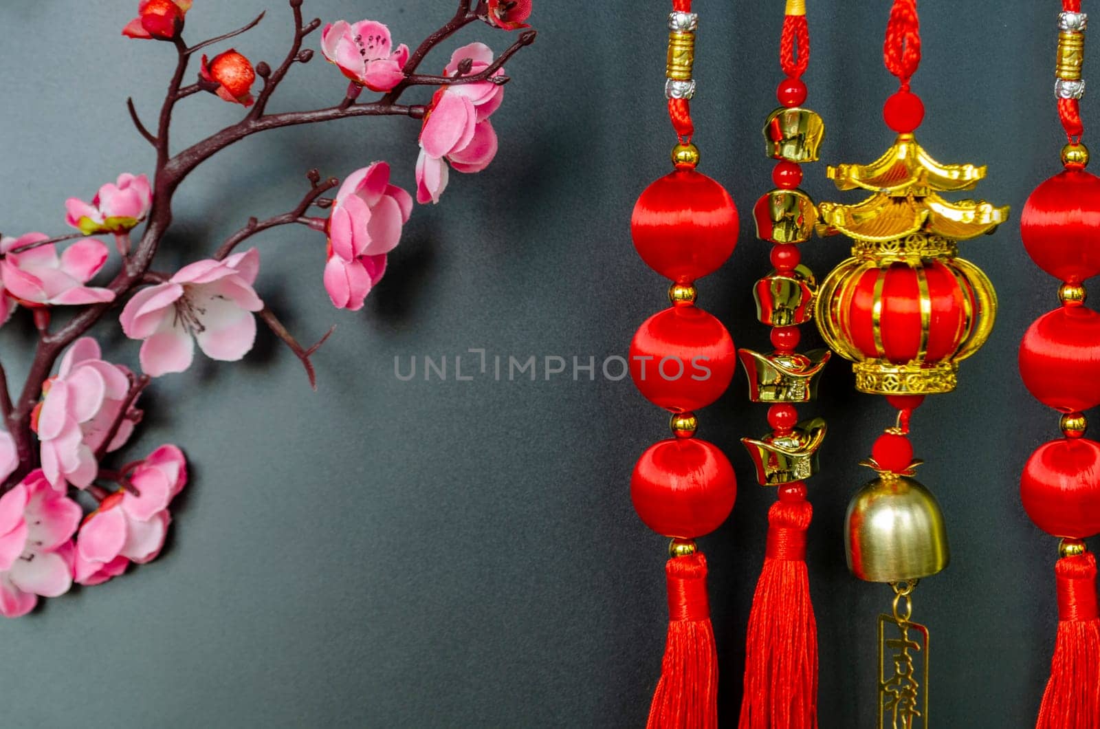 Chinese New Year decoration with Chinese Character on hanging lantern meaning safe journey and blessing with customizable space for text.