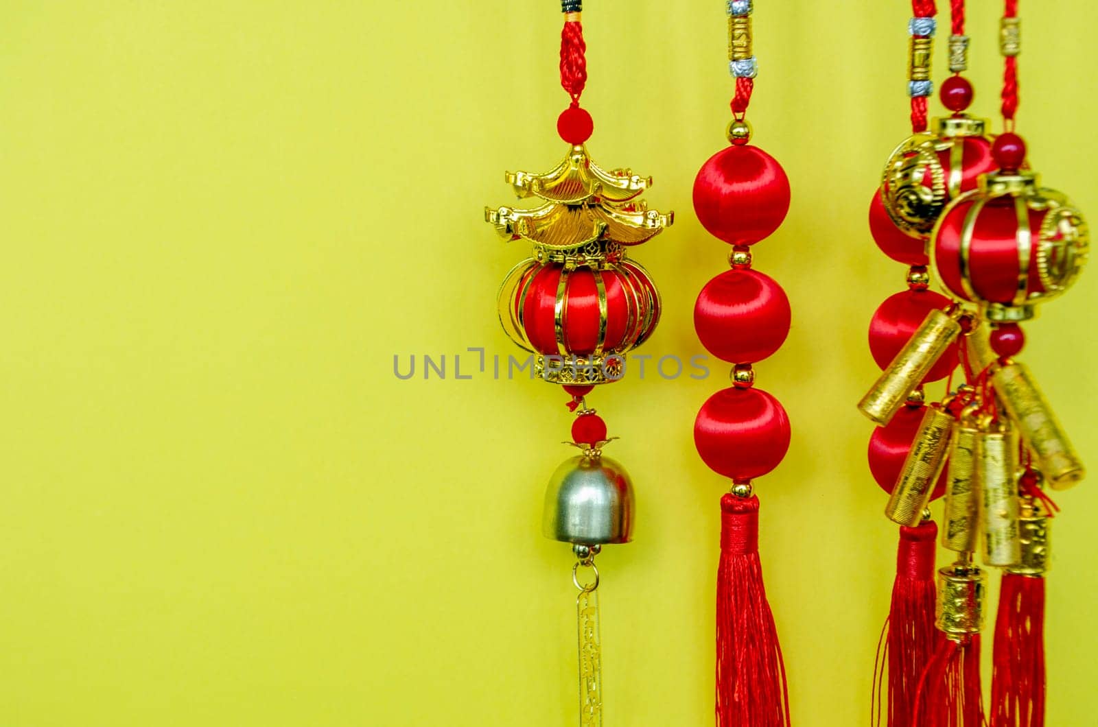 Chinese New Year decoration on yellow cover with customizable space for text. Chinese New Year celebration concept.