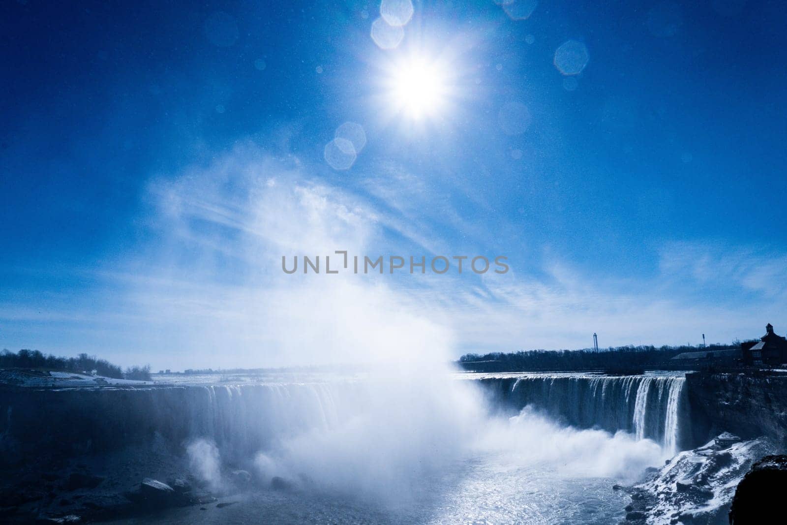 Niagara with sun and water spray. Shooting Location: Toronto