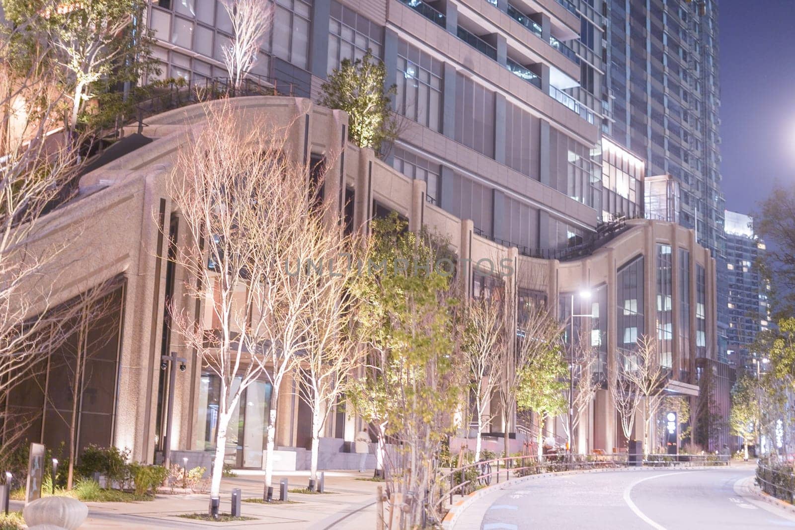 Modern architecture illuminated at night. Shooting Location: Minato Ward, Tokyo