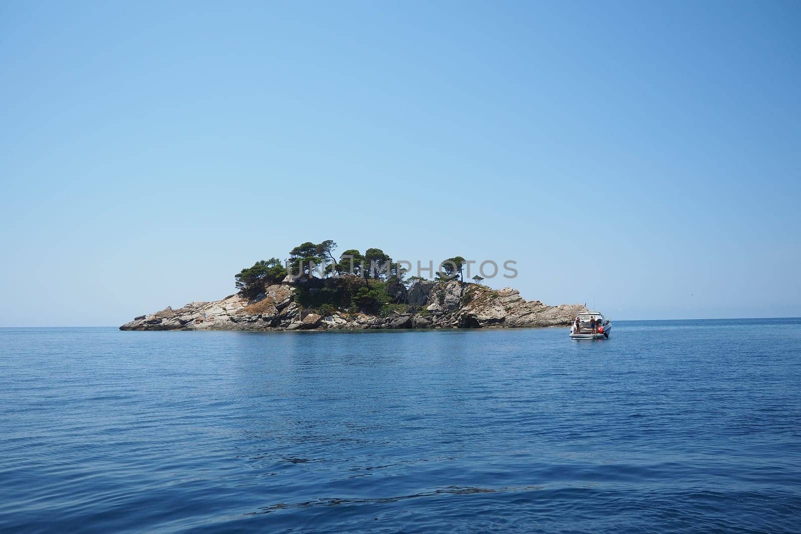 Petrovac, Montenegro, 07.27.24: Katic and Sveta Nedelja are two small islets on the Adriatic Sea, located opposite of the town of Petrovac in the Montenegrin municipality of Budva. Church on the rock.