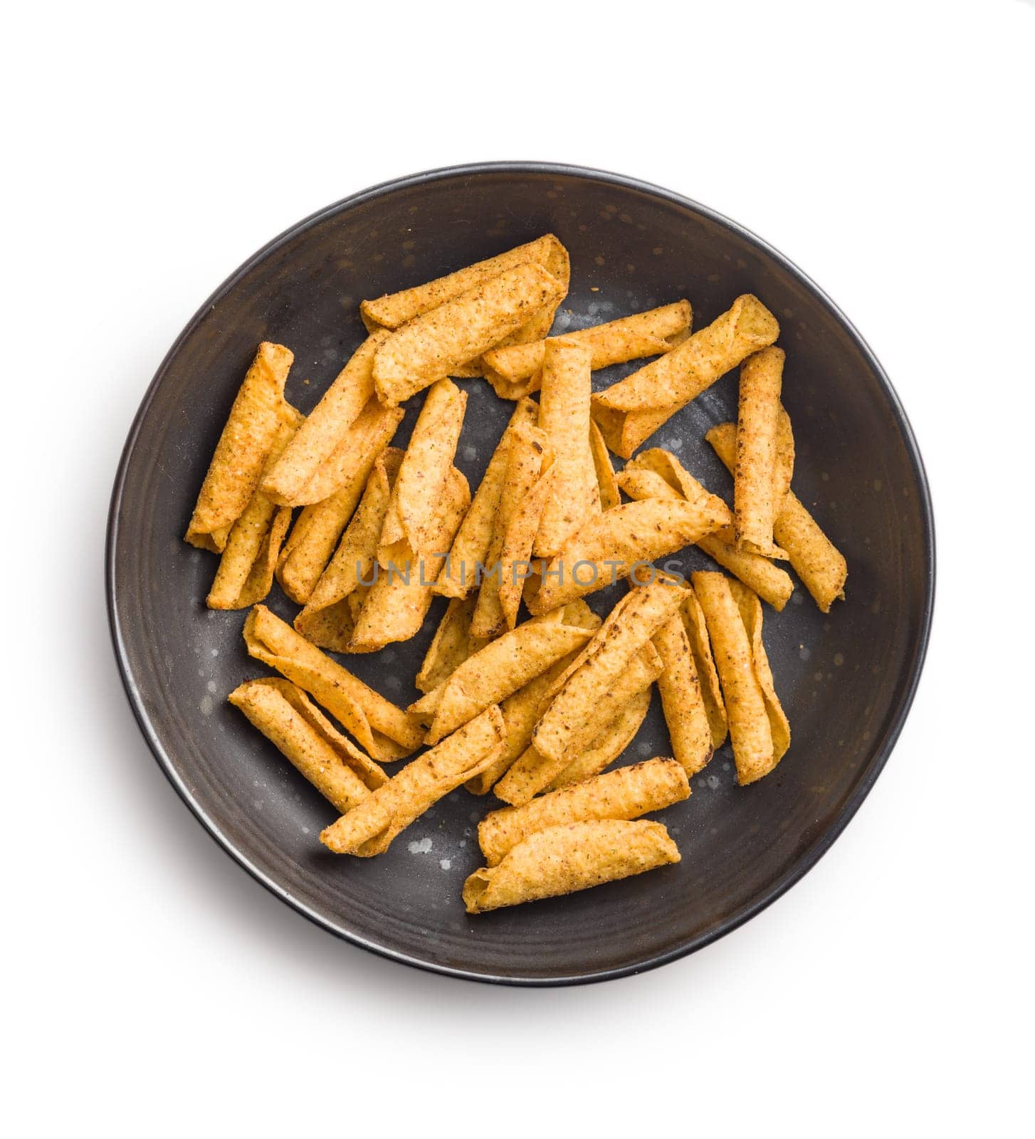 Rolled nachos tortilla chips on plate isolated on a white background.