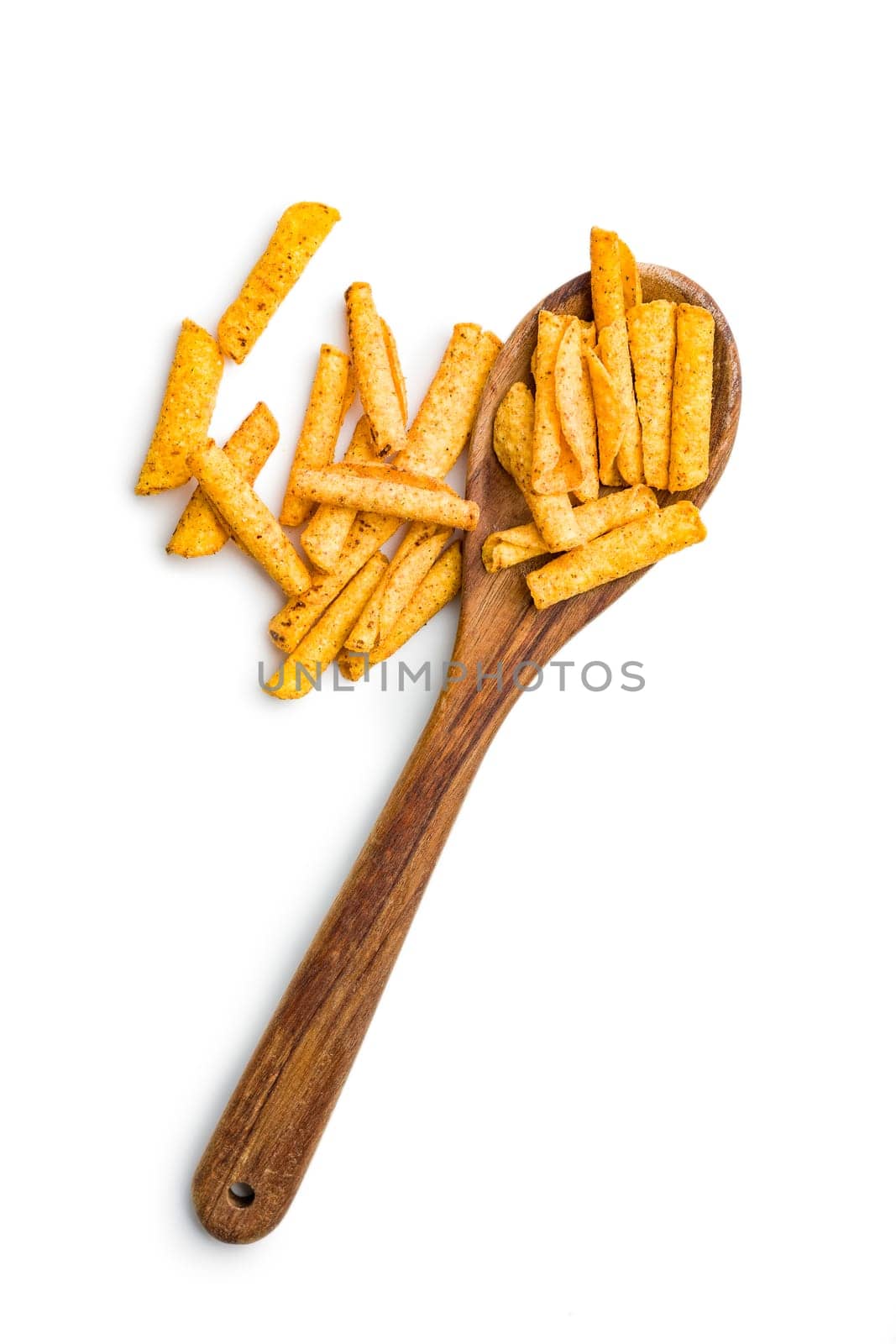 Rolled nachos tortilla chips on spoon isolated on a white background.