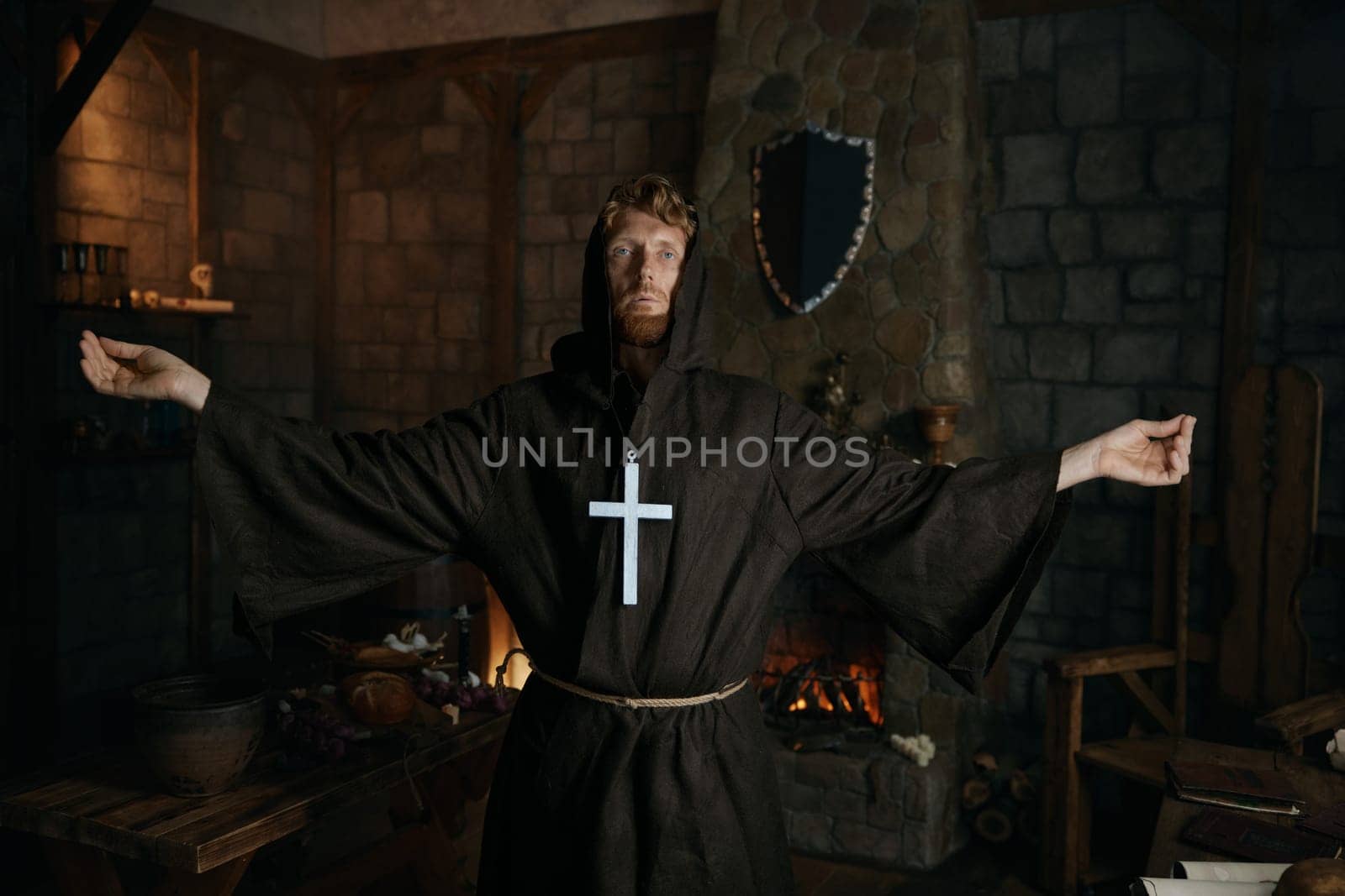 Medieval monk standing in cathedral. Religion and faith concept