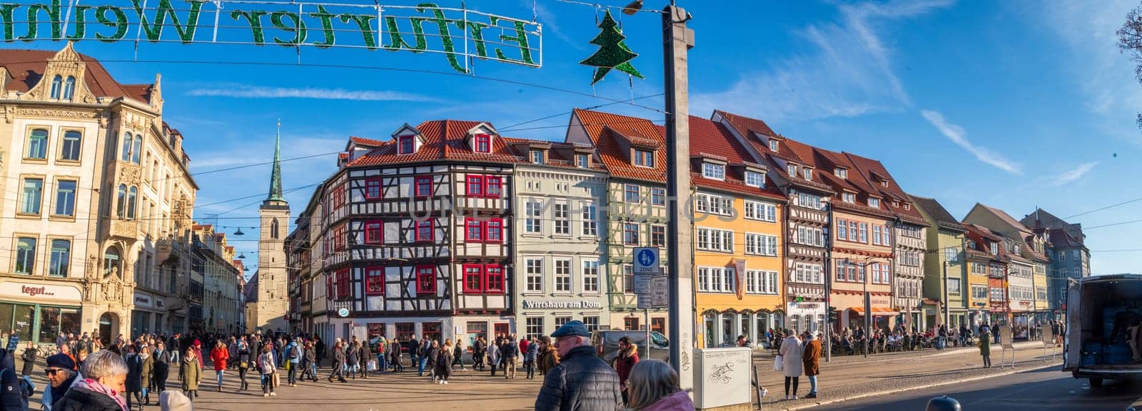 ERFURT, GERMANY - NOVEMBER 30, 2024: Lots of people visiting the annual christmas market on the Dom square