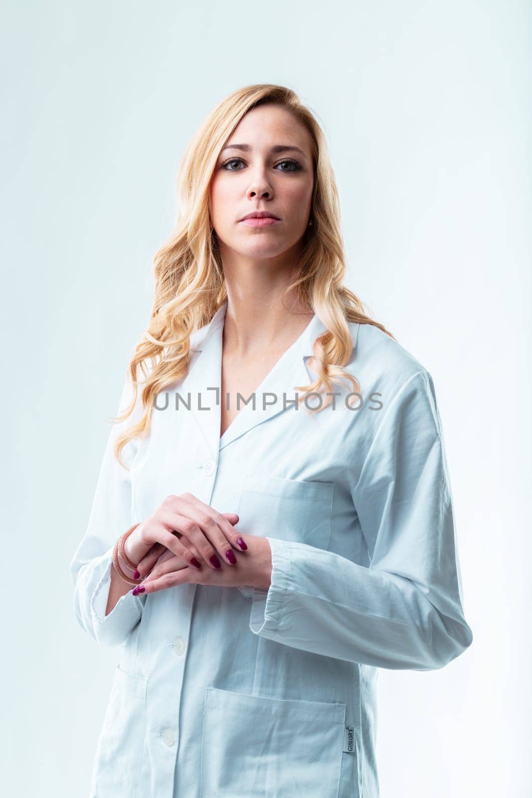 Knowledgeable blond scientist, keen to use her skills for humanity, wary of employer's ethical disregard, not just for profit