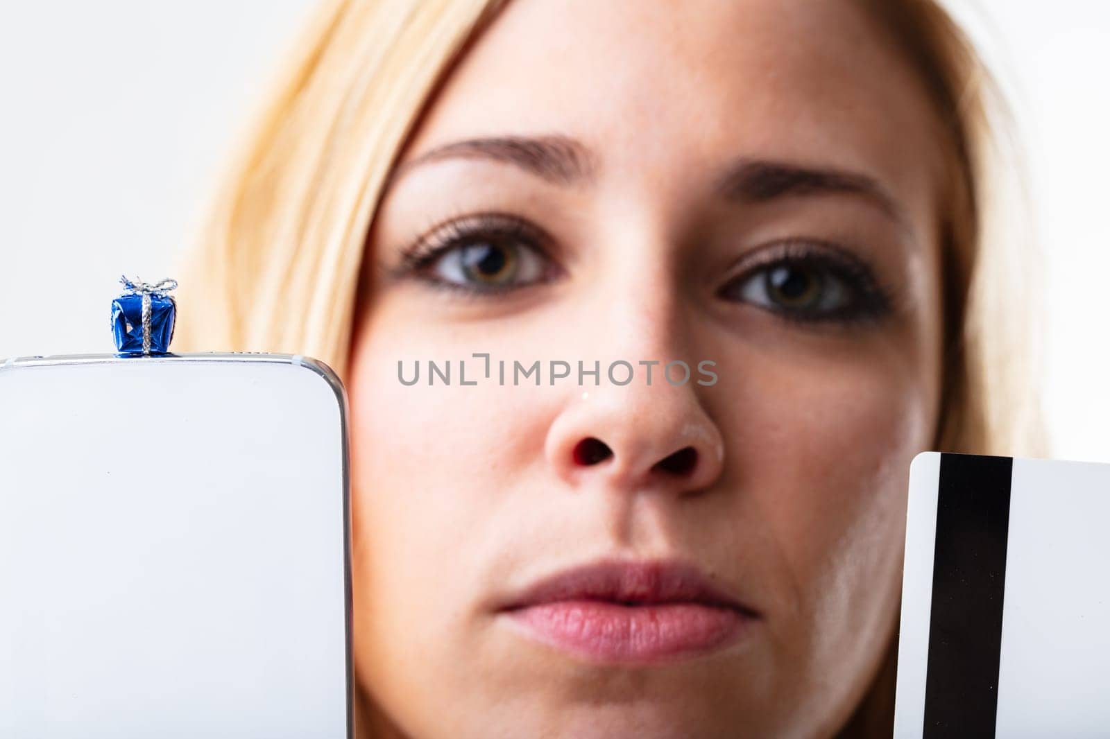 Young woman delighting in online shopping via smartphone. Convenience and speed in the digital era