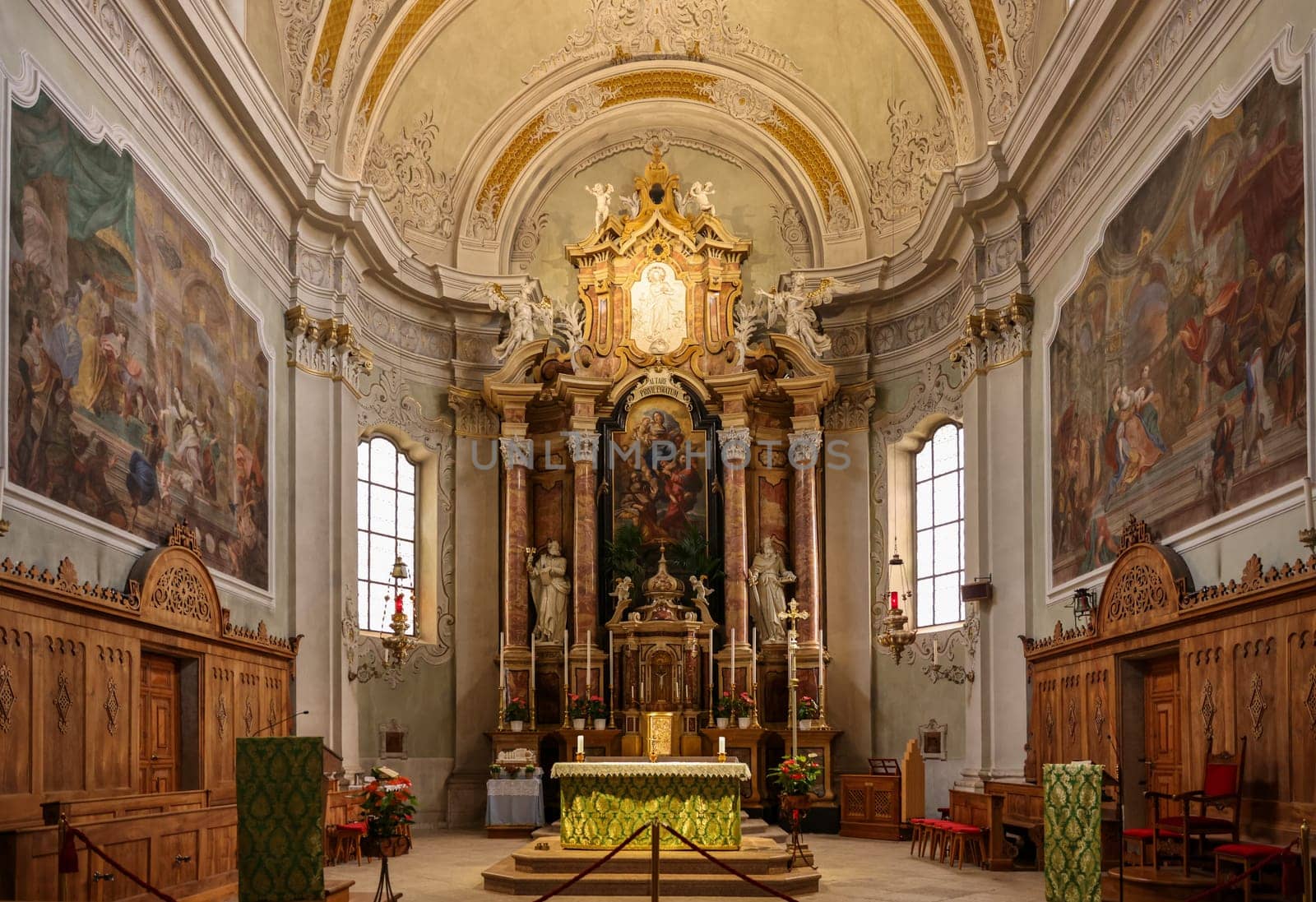 Cortina d'Ampezzo, Italy - September 6, 2024: Main altar of Basilica Parrocchiale SS. Filippo e Giacomo in Cortina d'Ampezzo, Province of Belluno, Veneto, Italy