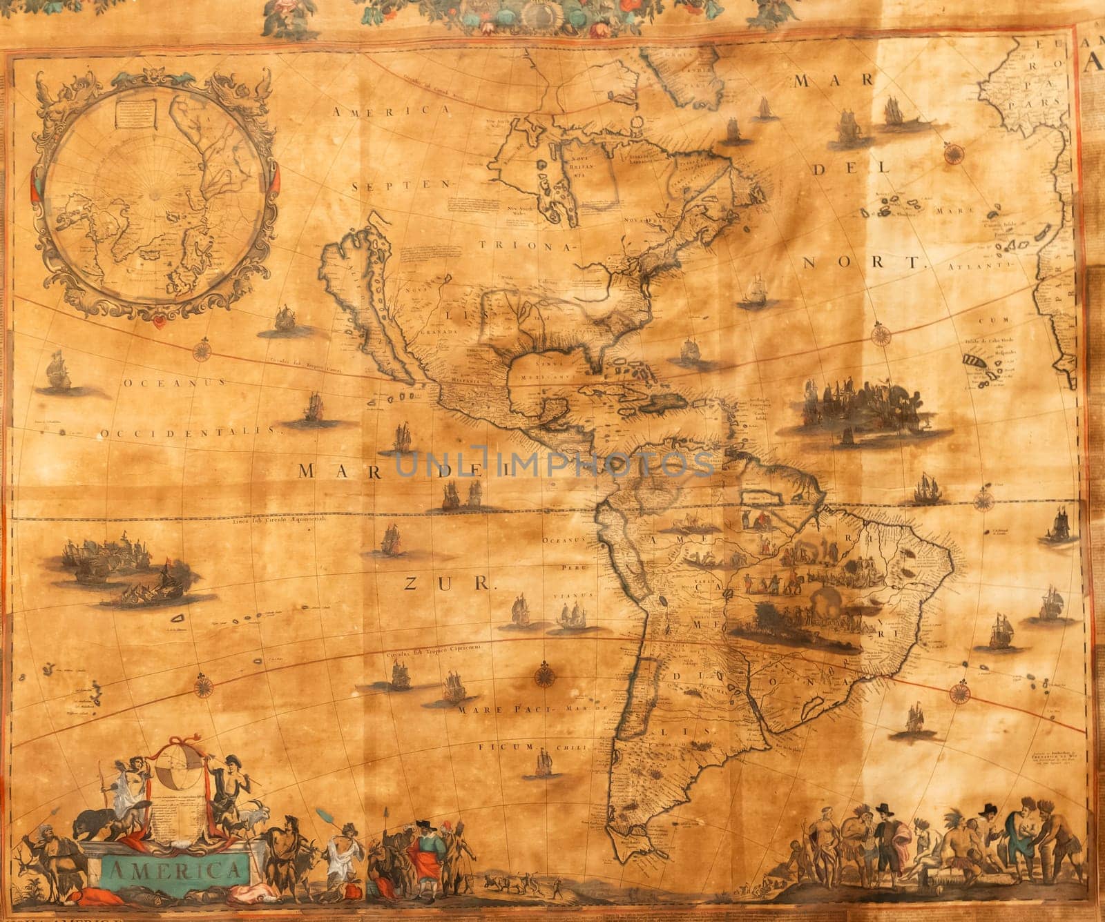 Genoa, Italy - 28 December 2023: ancient cartography located in Spinola Palace. Authentic old map showing the world known to Europeans in the mid 17-th Century. Exploration, geography, vintage background.