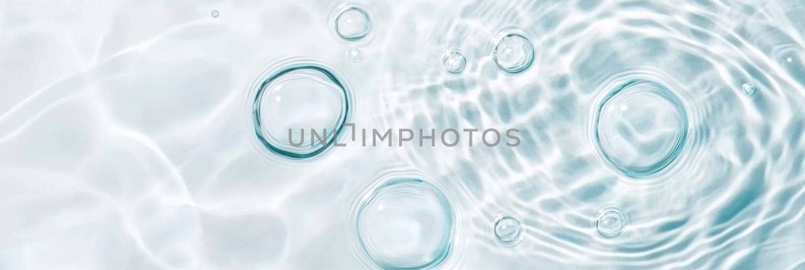 Ripples in clear blue water with abstract circular patterns, suitable as calming SPA background, AI generated