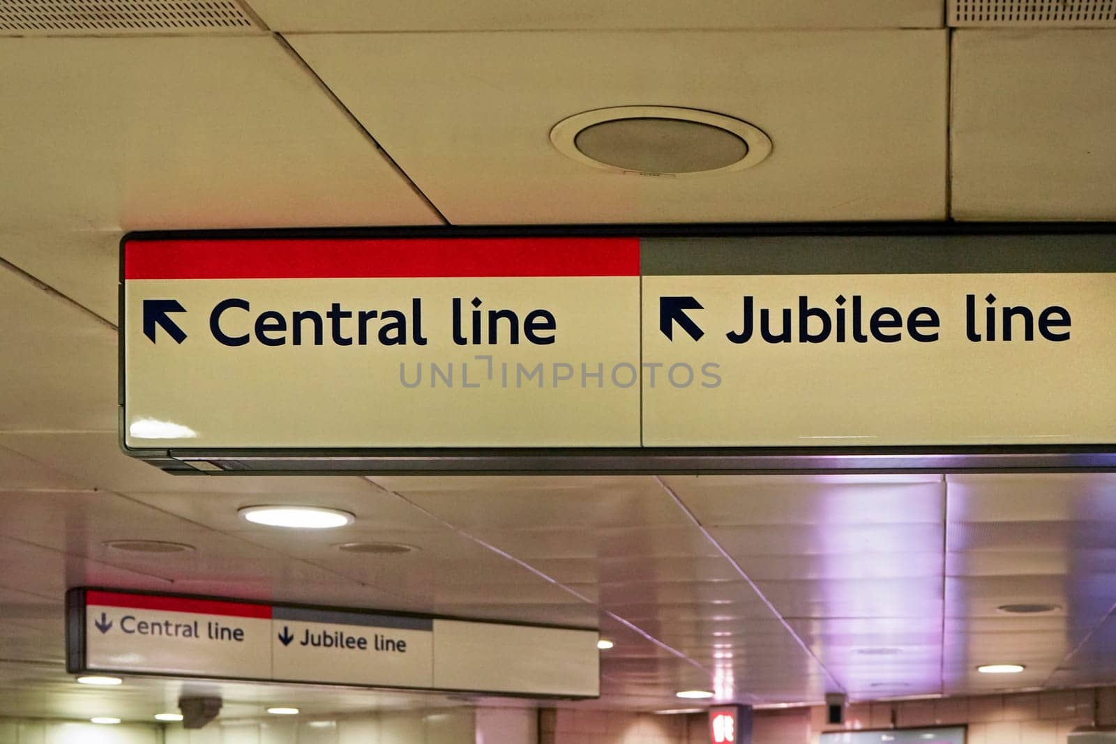 London, United Kingdom - February 01, 2019: Direction tables with arrows pointing to Central and Jubilee line in London underground station