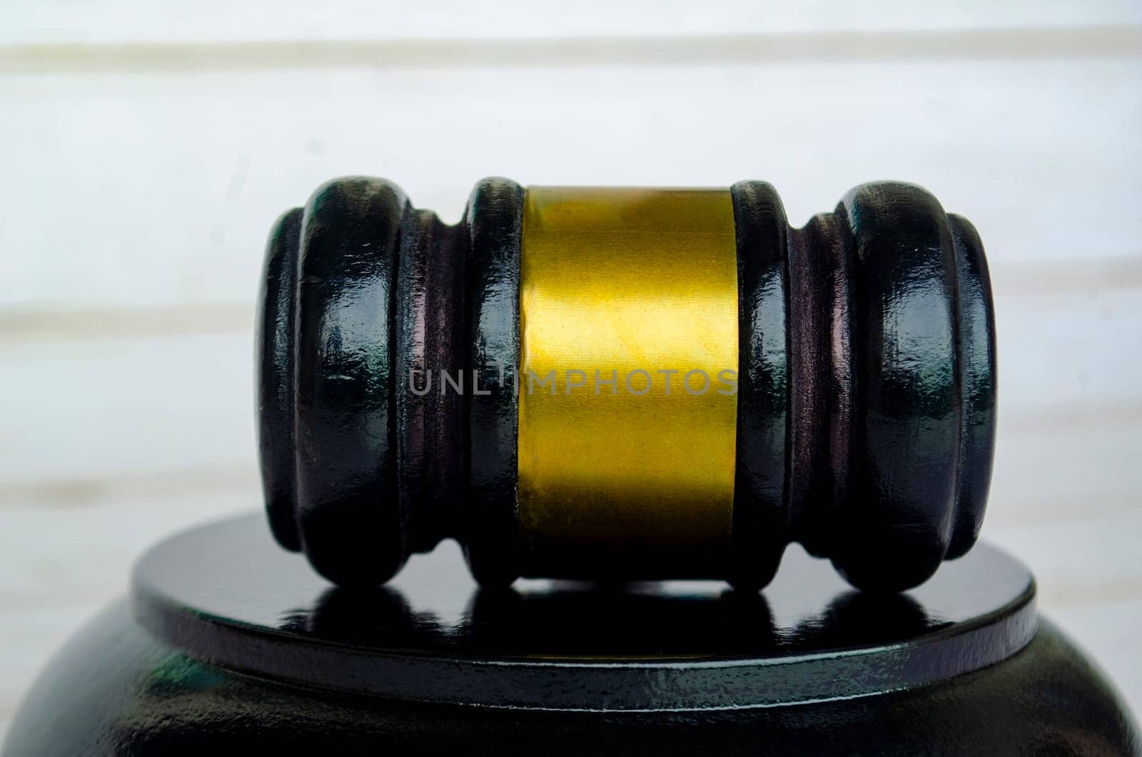 Close up of lawyer's gavel with customizable space for text. Laws and regulations concept.