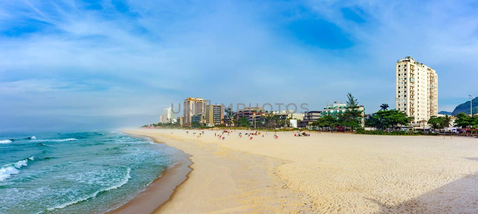 Morning at Barra da Tijuca beach, one of the most famous in the city of Rio de Janeiro with its buildings facing the sea