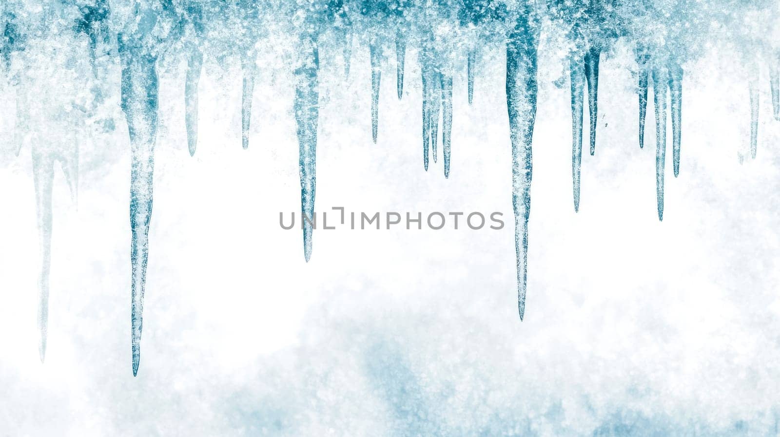 Small icicles forming from frosty air on a cold winter day create a delicate, icy scene, beautifully contrasting against a pristine white background