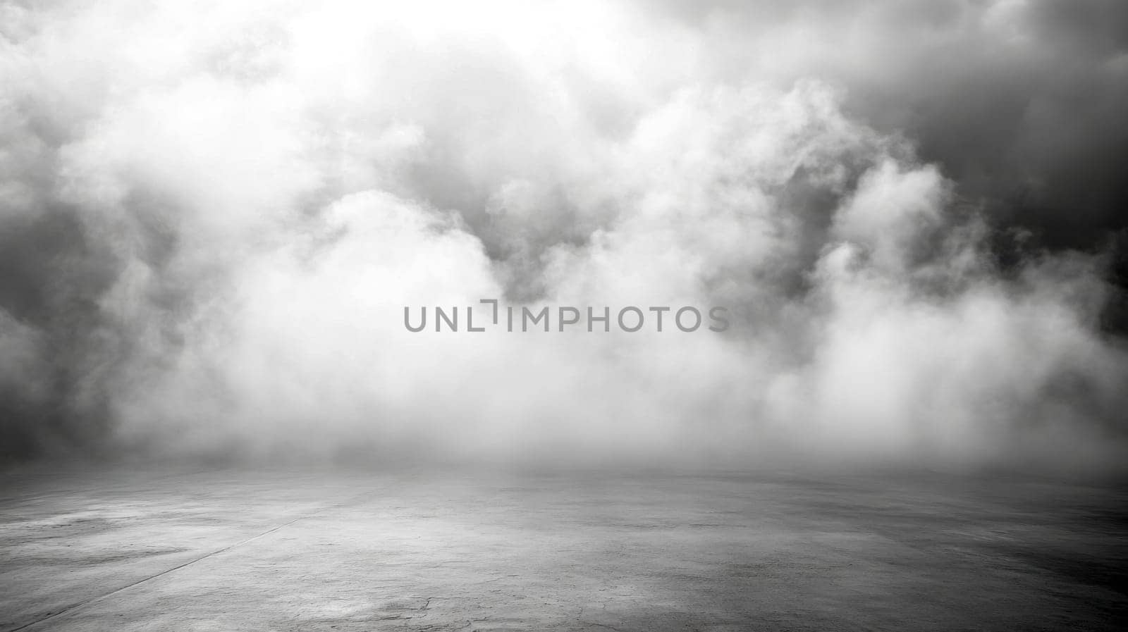 Dense fog rolling over an empty concrete road creates a mysterious and atmospheric scene, perfect for showcasing concepts of uncertainty, mystery, or the unknown