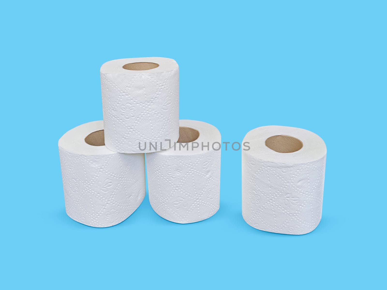 Toilet paper roll on blue background