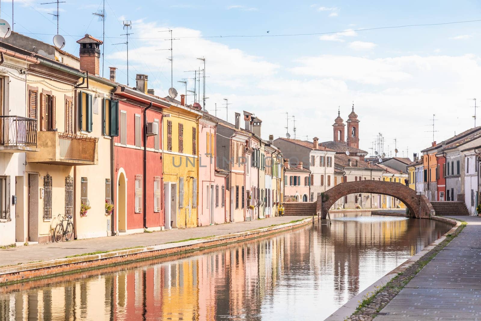 Comacchio, Italy - 11 July 2024: traditional colored buildings in Comacchio village, named the Little Venice