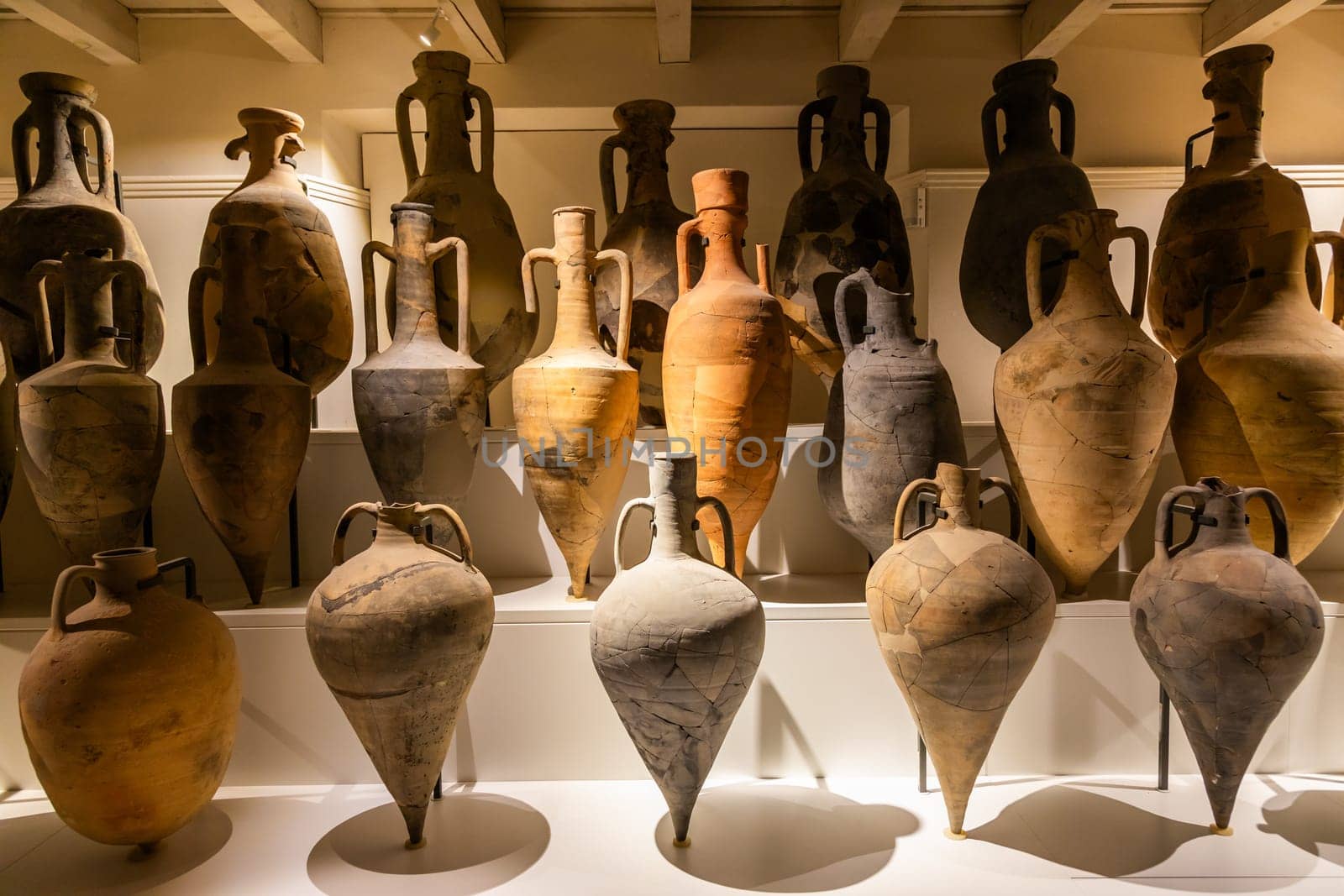 Comacchio, Italy - 11 June 2024, Delta Antique museum interior. Mediterranean amphoras. Italic and Greek wine and oil container.