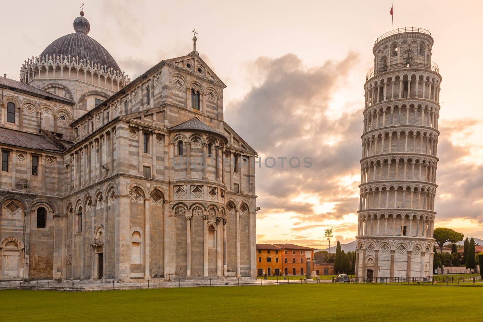 Pisa, Italy - 29 June 2023: cathedral sightseeing, travel destination, sunrise light, famous artistic building