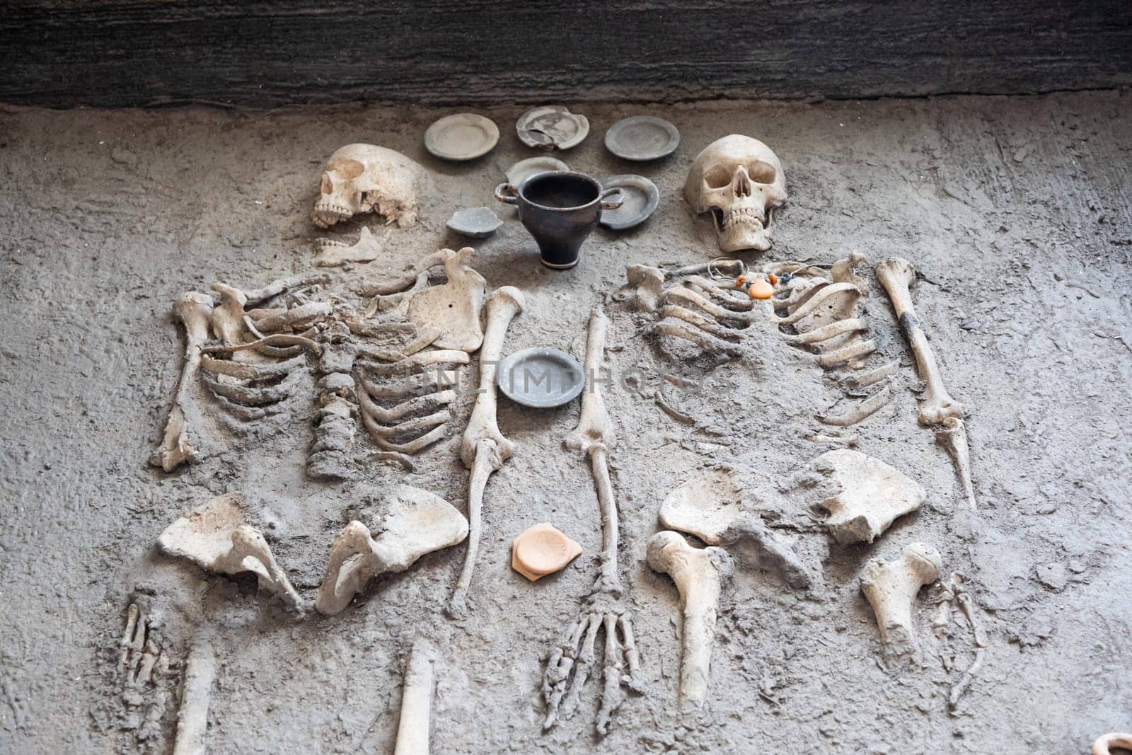 Comacchio, Italy - 11 June 2024, Etruscan tomb, inhumation of two deceased, in wodden crate. 350-300 BC.