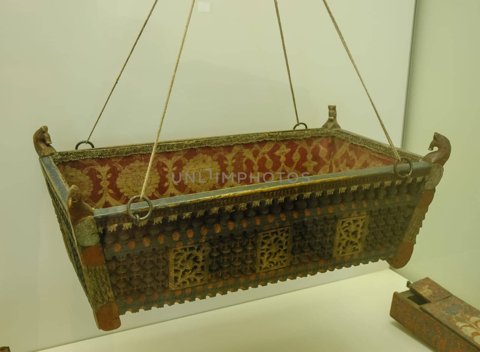 An old wooden cradle for a baby. Museum of Russian Culture.