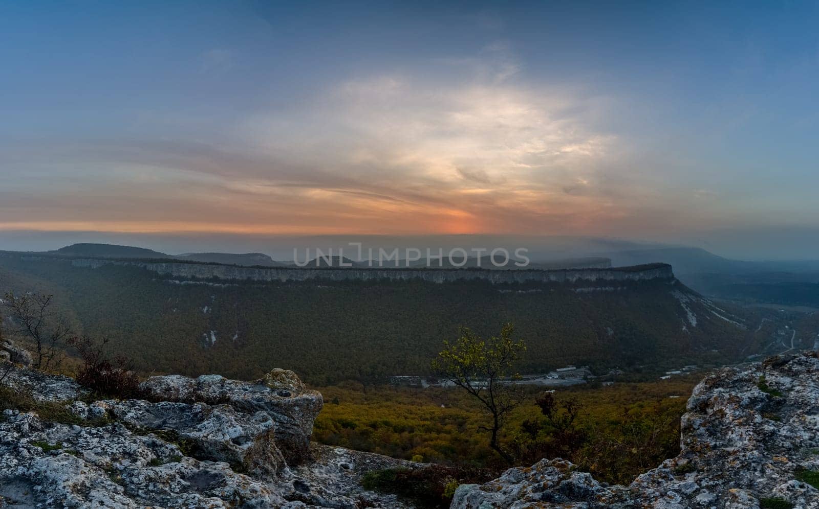 Mountains and forests of Crimea. coniferous and deciduous trees on the hills of the mountains and rocks