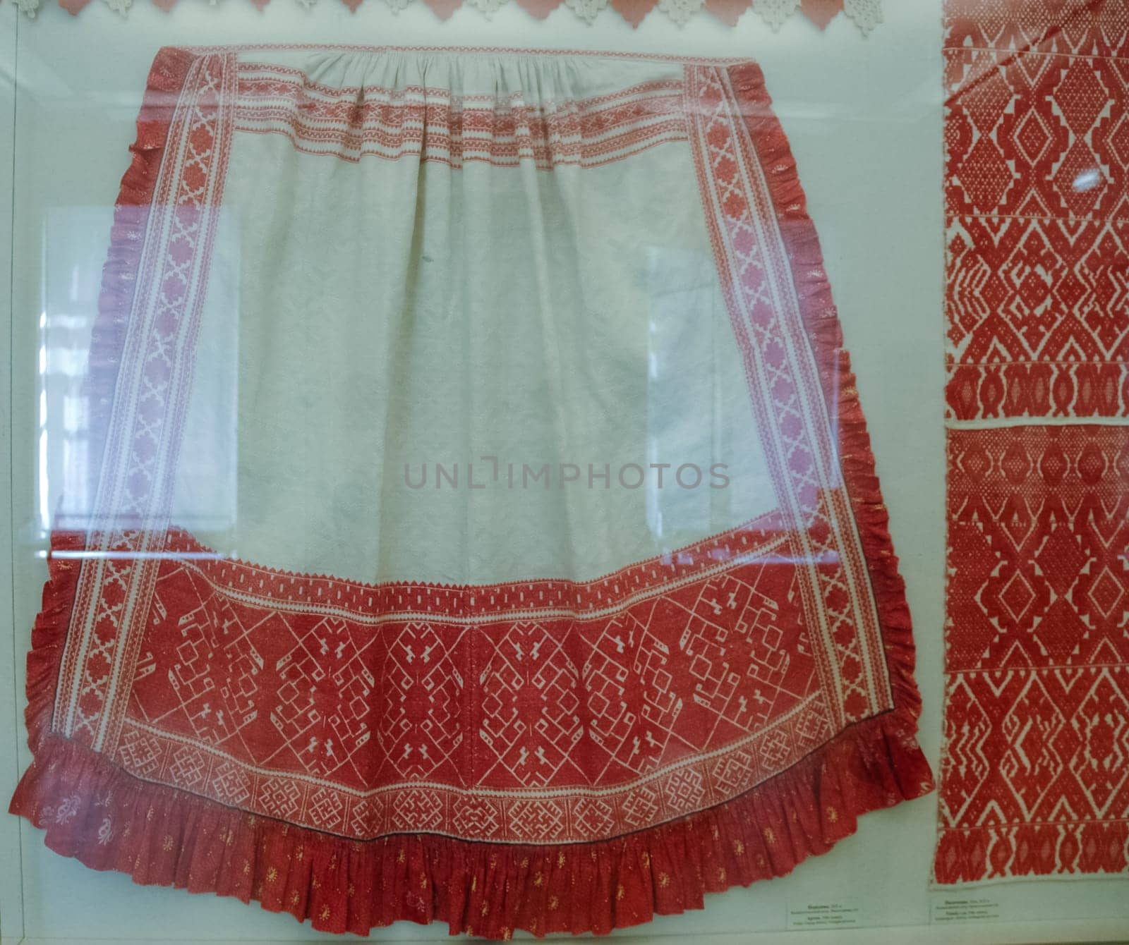 a Scarves and towels and scarves with folk Russian ornament.