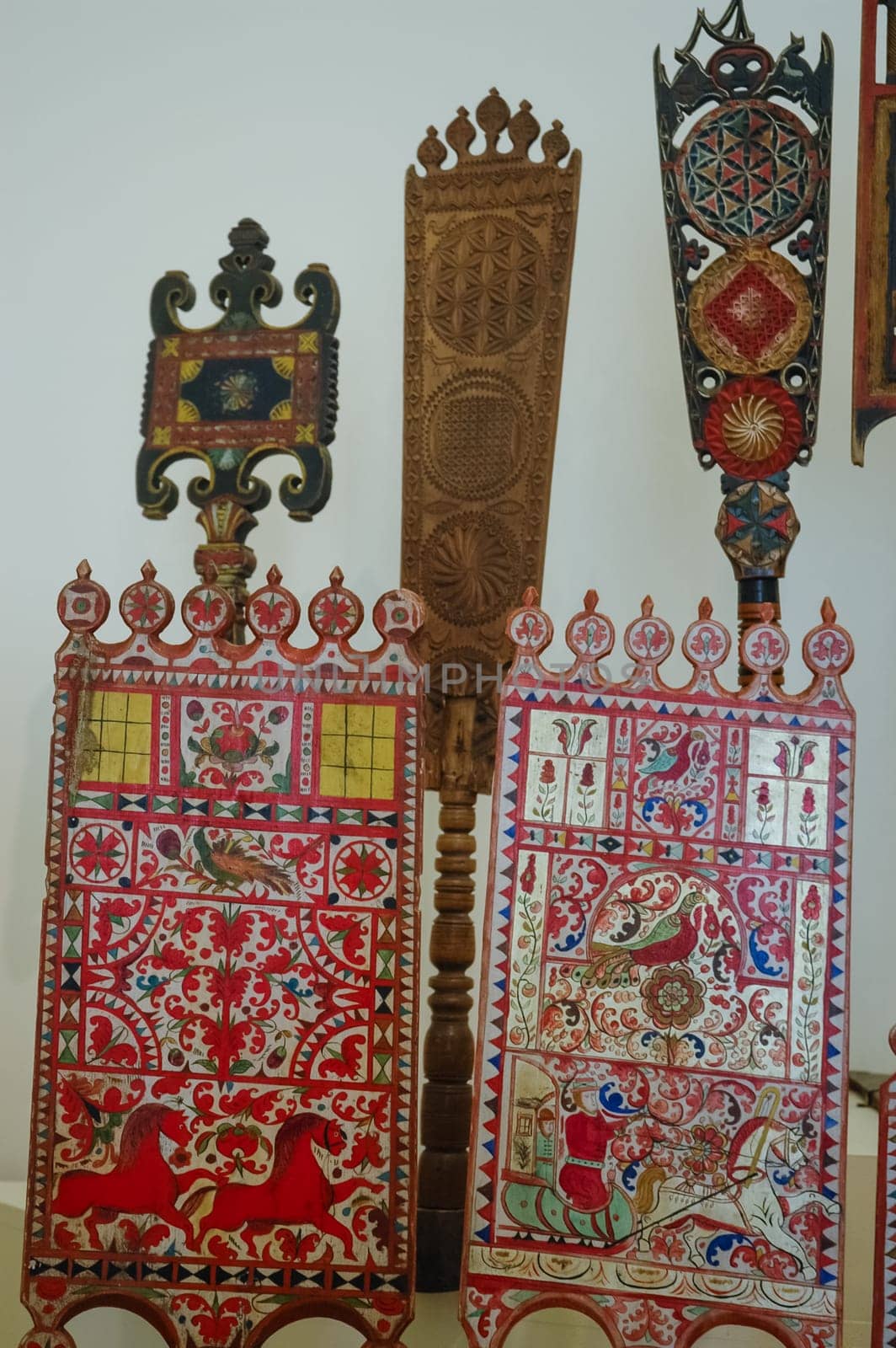 Wood carvings, spinning with folk Russian ornaments.