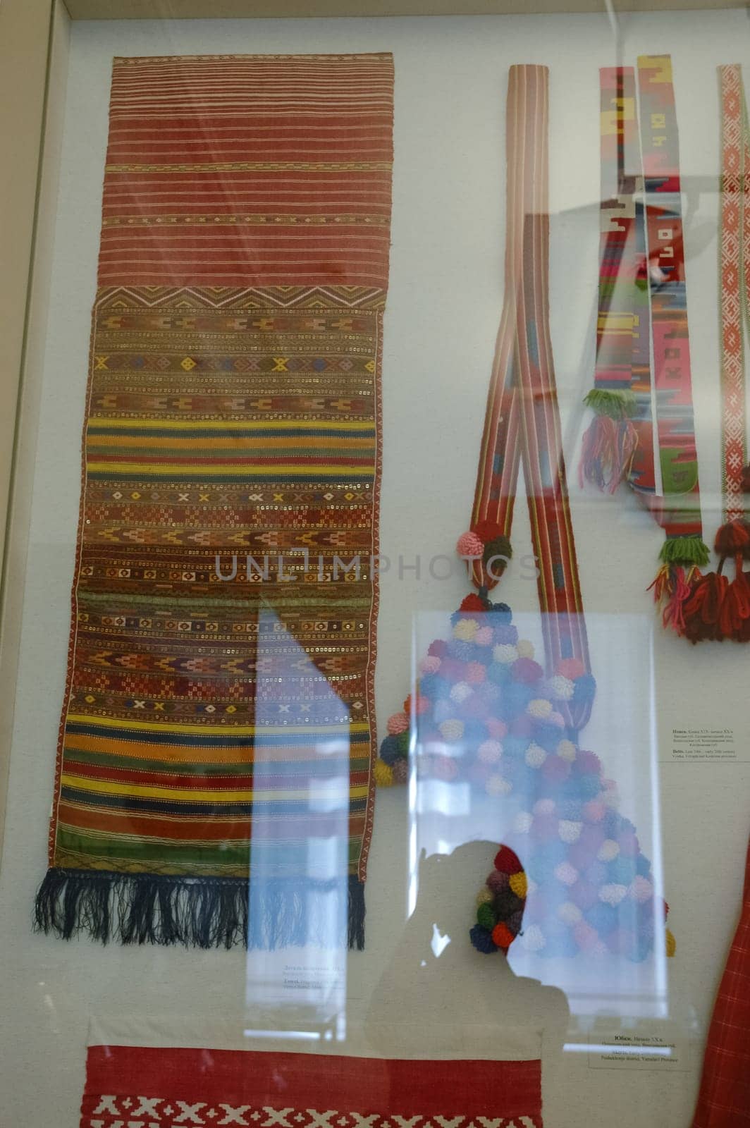 a Scarves and towels and scarves with folk Russian ornament.