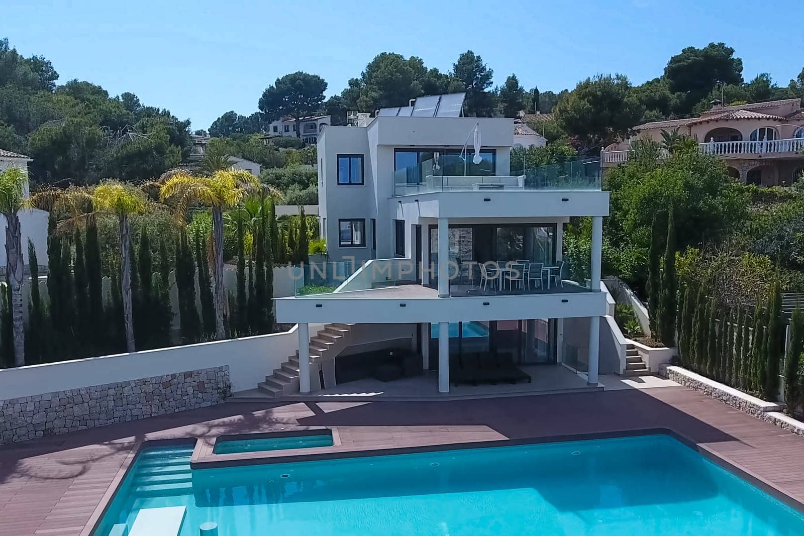 A small house with a swimming pool on the shores of the Mediterranean Sea. Accommodation in Spain.
