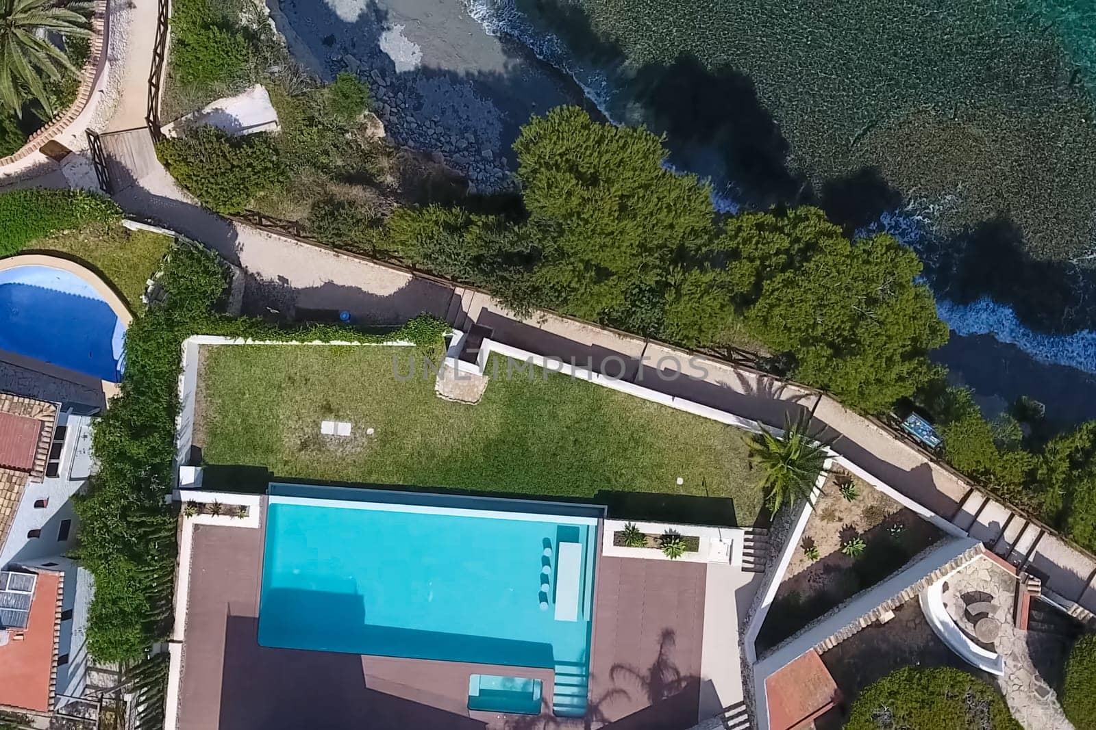 A small house with a swimming pool on the shores of the Mediterranean Sea. Accommodation in Spain.