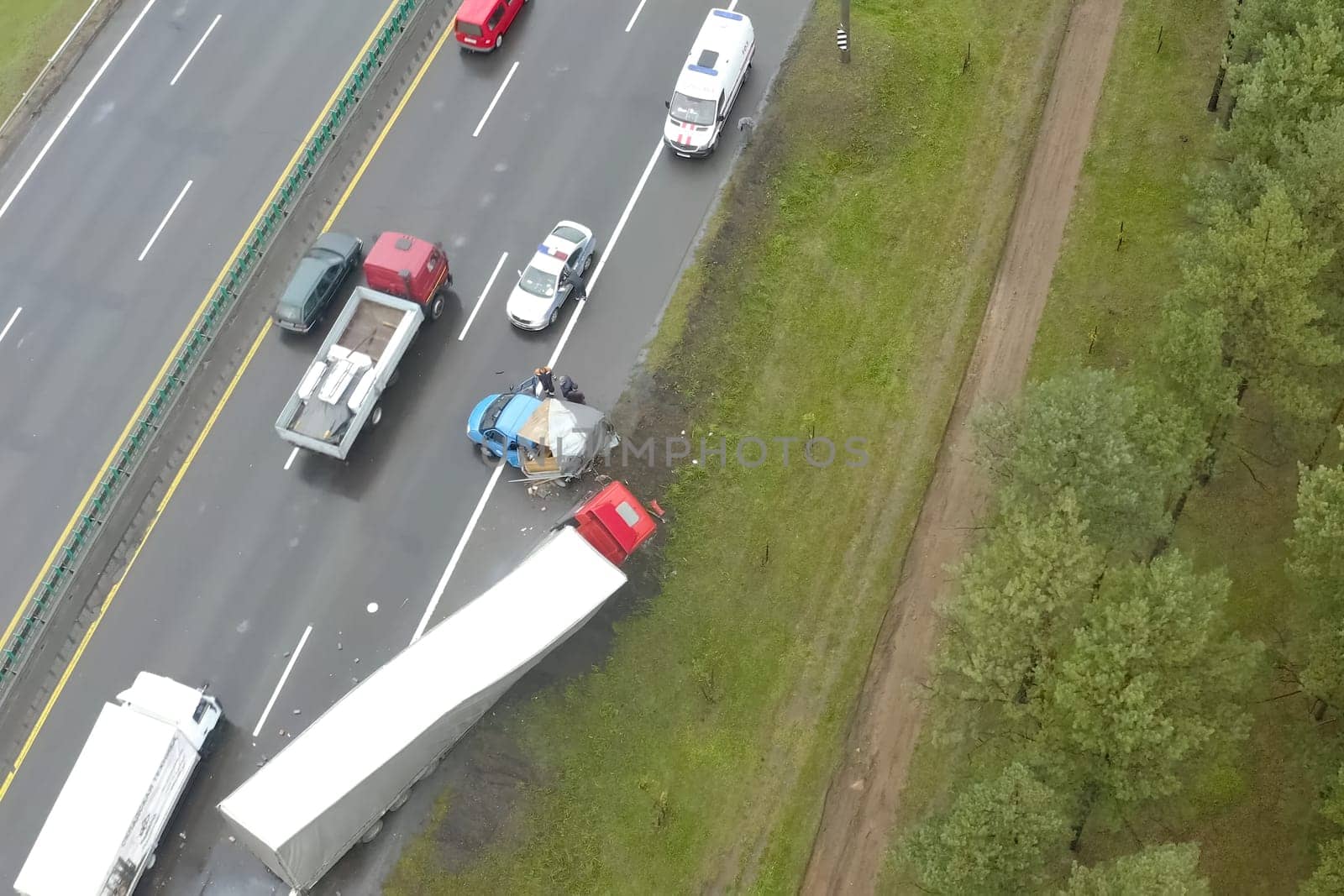 Moscow, Russia - June 24, 2020: Accident involving a truck with a wagon and a minivan. The truck drove off the road.