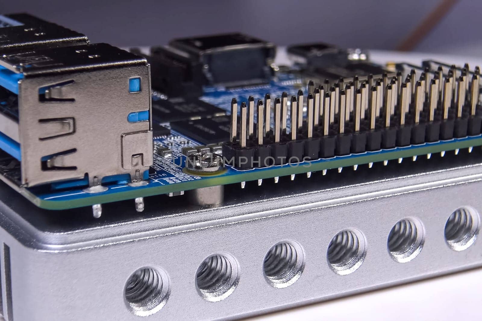 Pay a mini computer with a processor and interface connectors. Miniature computer technology.