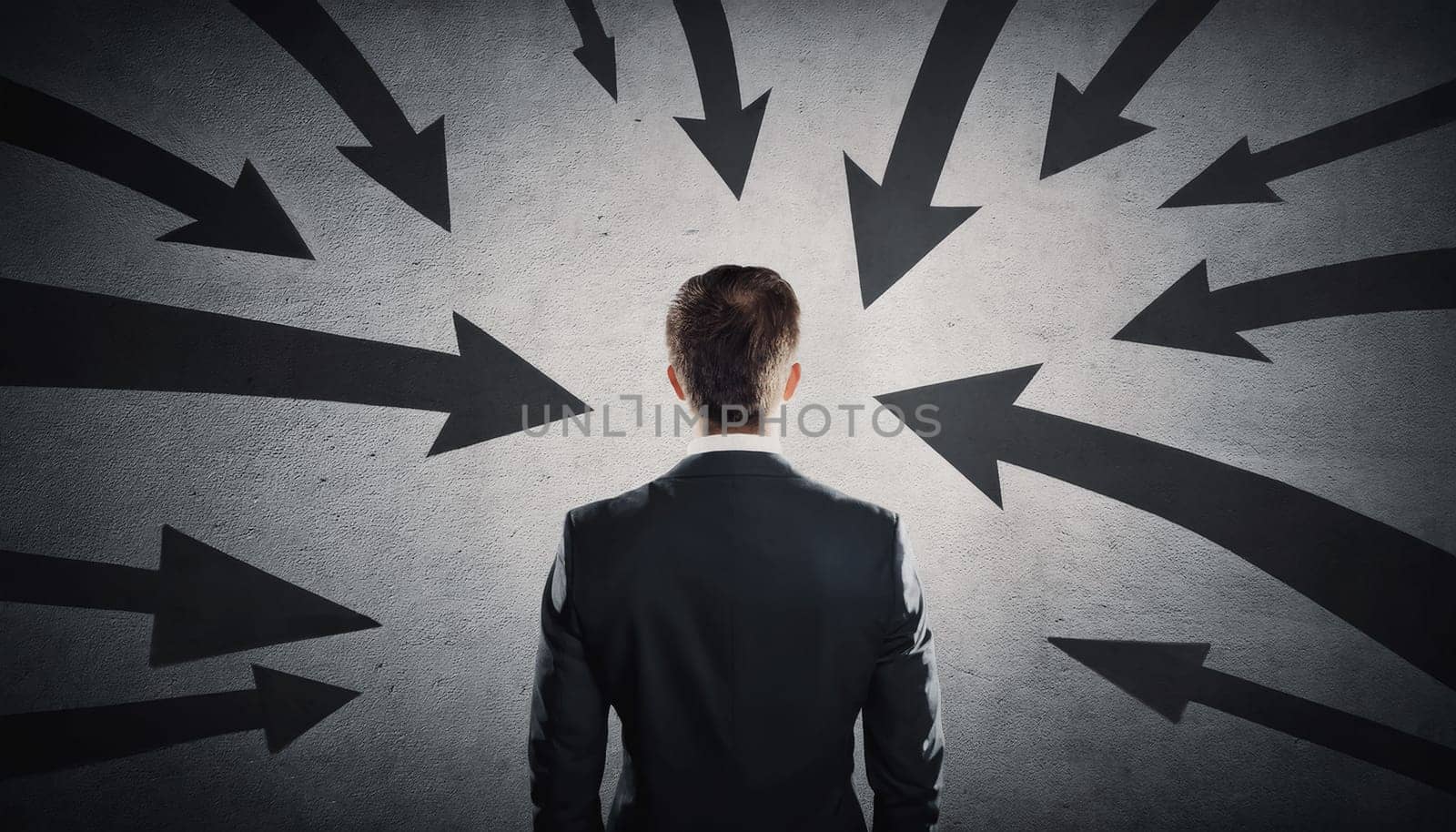 Rear view businessman in a dark room with multiple arrows pointing towards him, blaming as guilty person. Leading business under big pressure, social victim concept