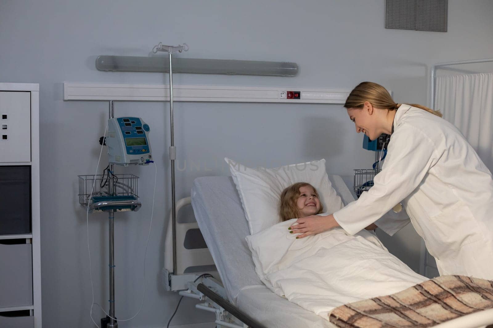 A dedicated doctor provides compassionate care to a patient in a wellequipped hospital, ensuring excellent healthcare