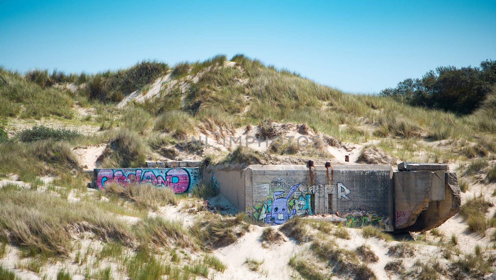 Ruin of a german bunker in Normandy, France from the Second World War, D-Day military invasion by the allies, history of Europe