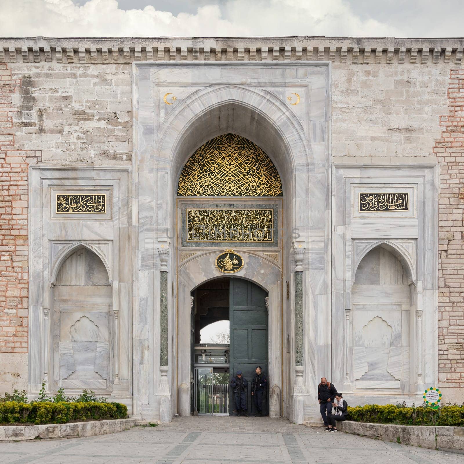 Istanbul, Turkey - May 11, 2023: Topkapi Palace: Imperial Gate, aka Saltanat Kapisi, or Royal Gate, leads to the First Courtyard of the palace
