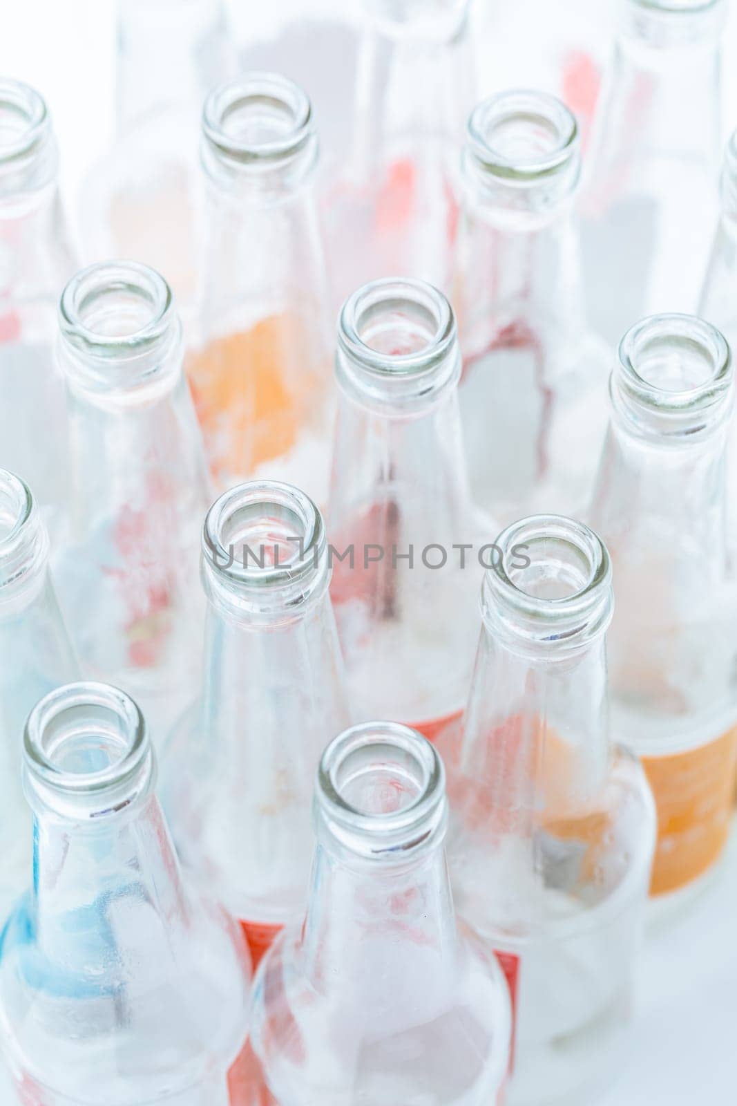 Empty glass bottles for recycling.