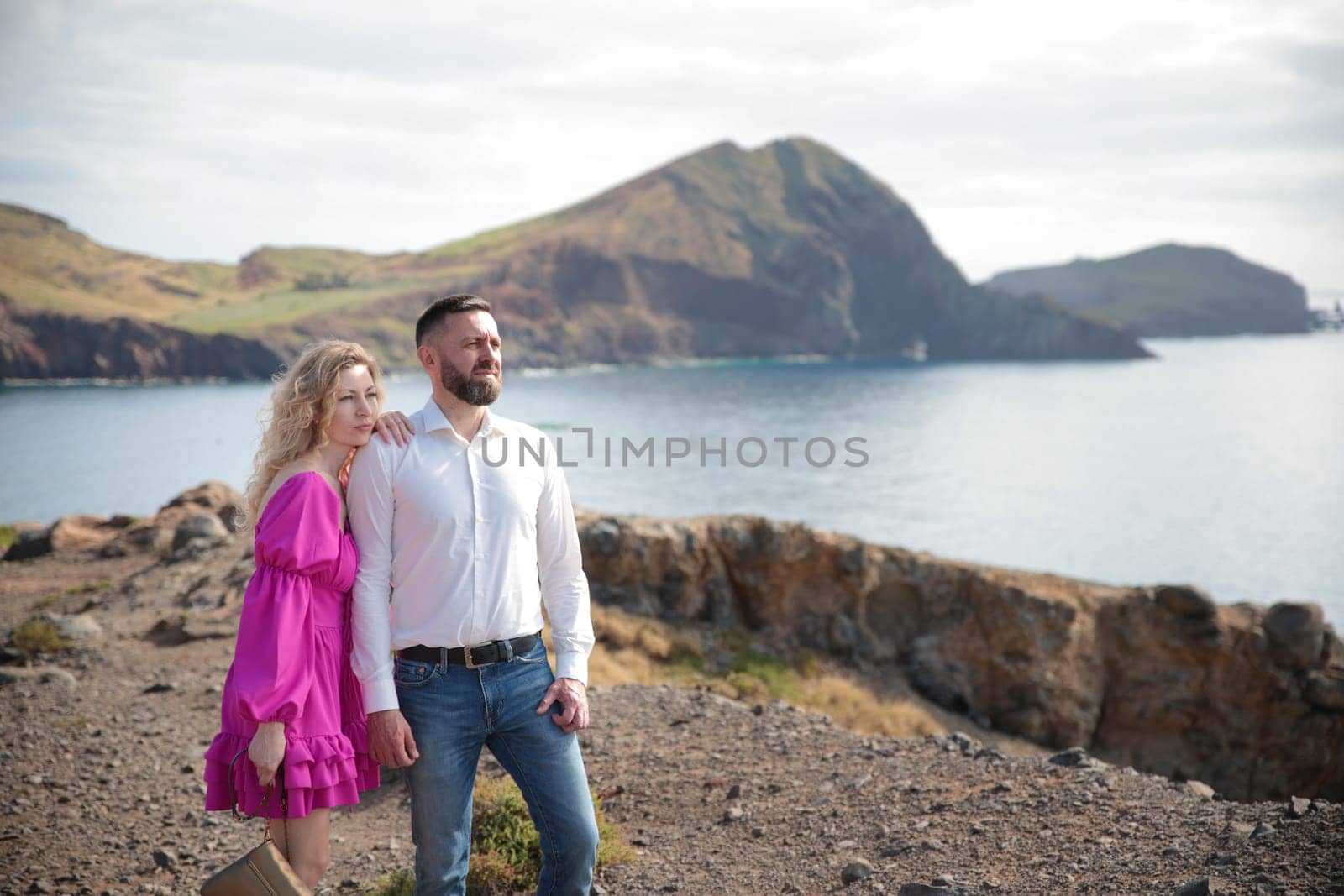 Tourists admiring breathtaking coastal landscape at ponta de s o louren o, madeira