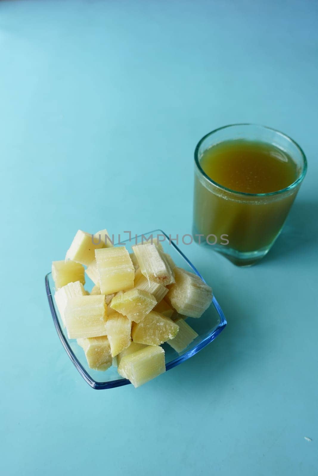 Sugarcane juice on a table .
