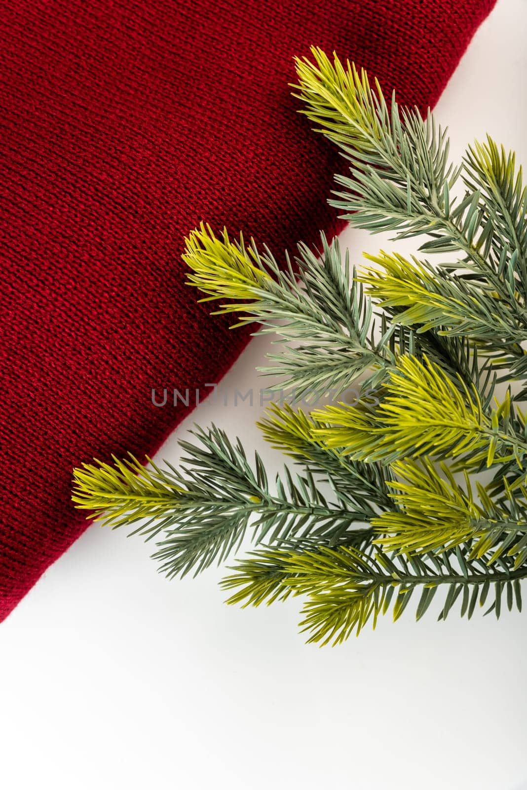 Fake fir tree branch for decorating of bouquets and home