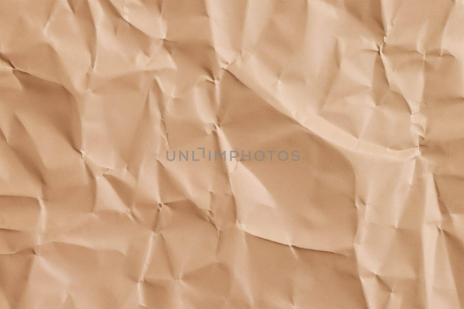 Brown crumpled paper texture. Abstract brown recycled paper background