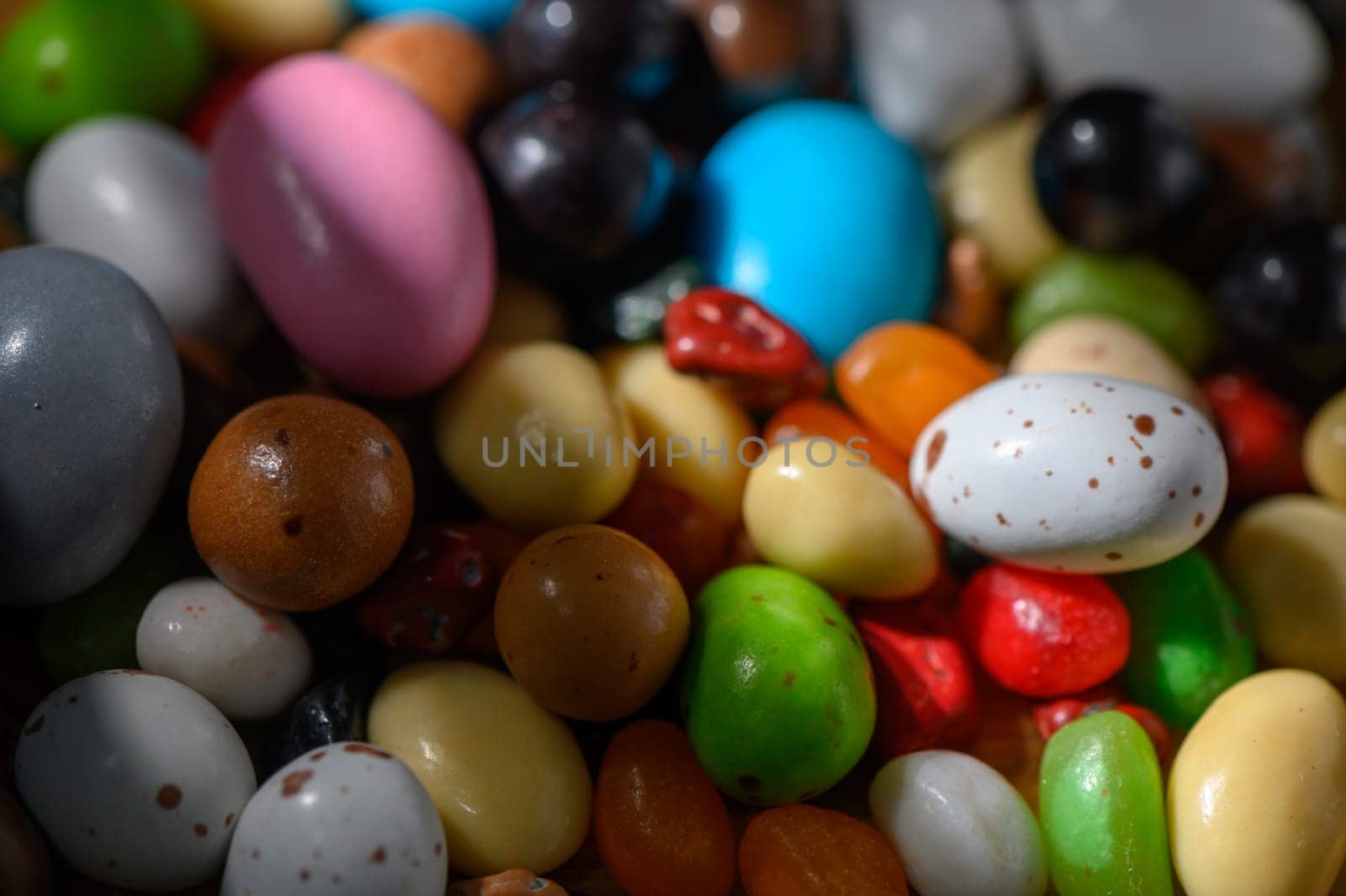 A delightful array of candies showcases an explosion of colors and shapes, bringing joy to sweet-toothed enthusiasts.