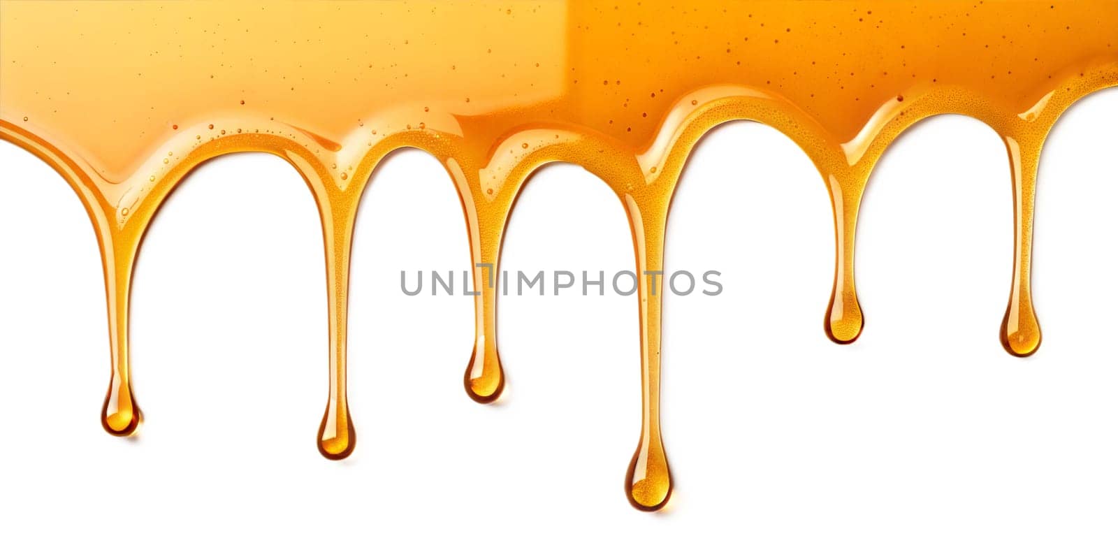 Golden honey dripping in smooth streams, creating a rich and glossy texture. Sweet, natural, and delicious syrup. Isolated on white background.