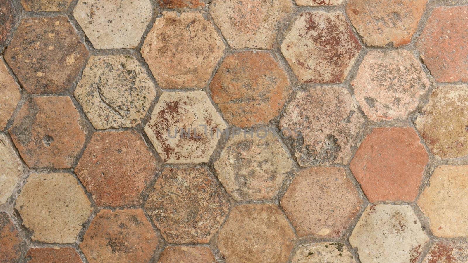 Hexagonal vintage antique beige tile in a french old manor Banner