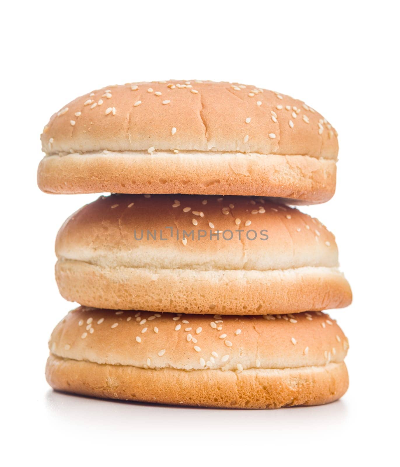 Empty burger bun with sesame seeds isolated on a white background.