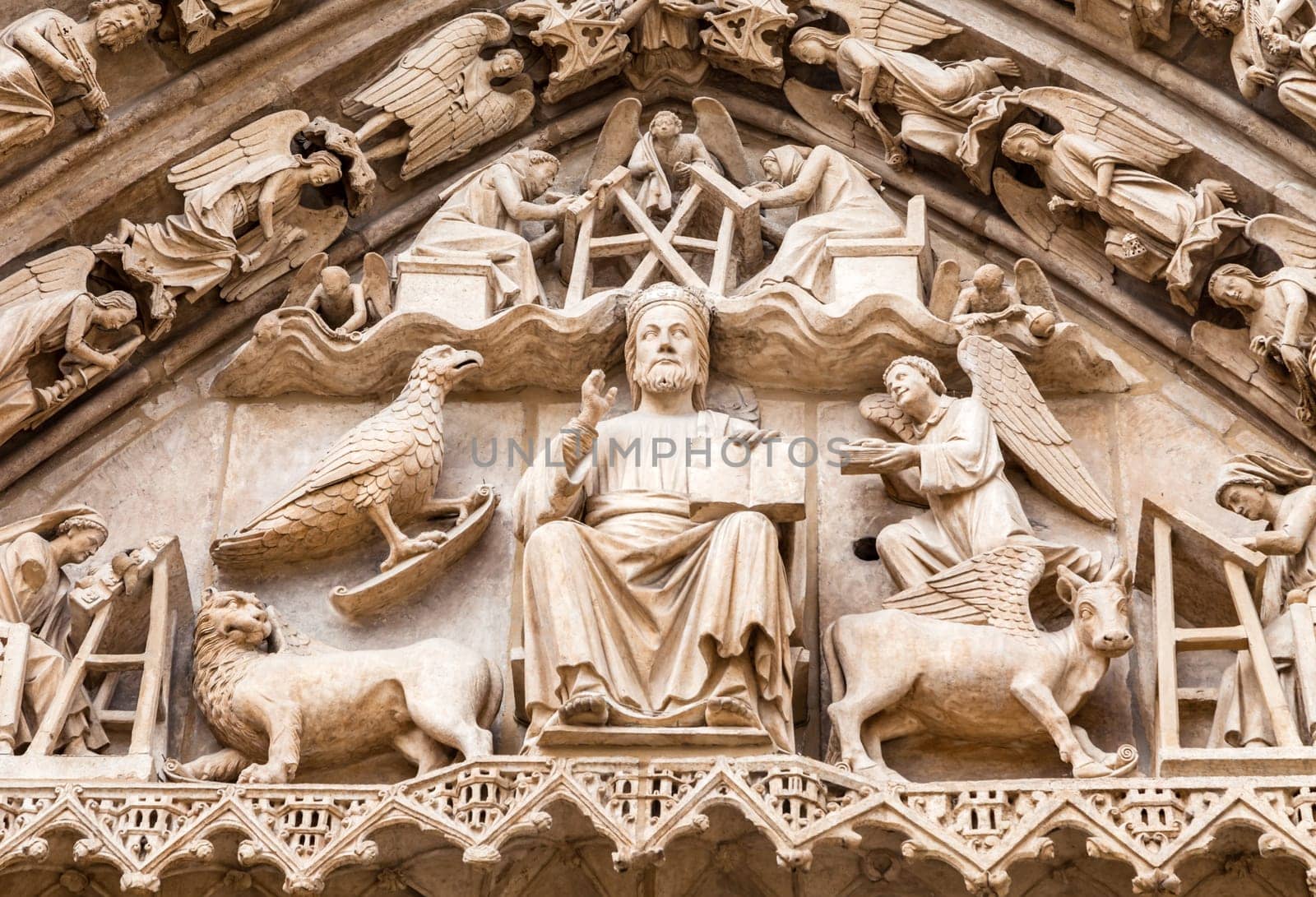 Detailed stone facade of the Cathedral in Burgos, Spain, with its gothic artwork.