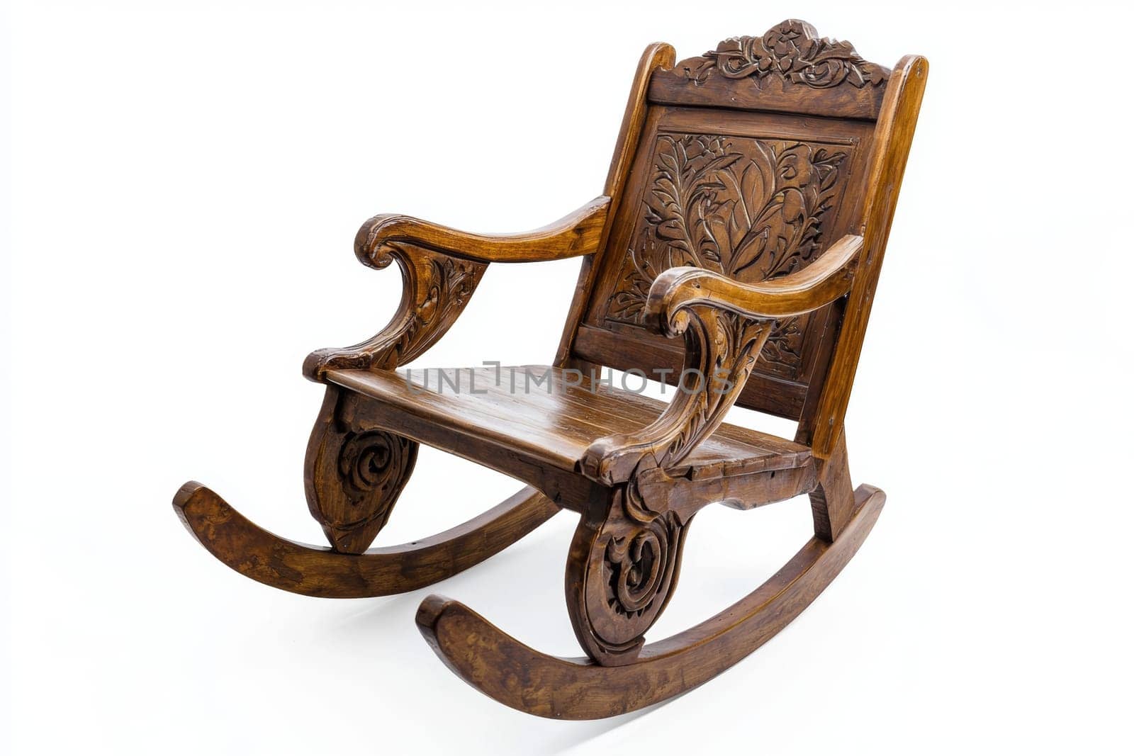 A beautifully crafted wooden rocking chair featuring detailed carvings stands on a bright white background, showcasing its elegance.